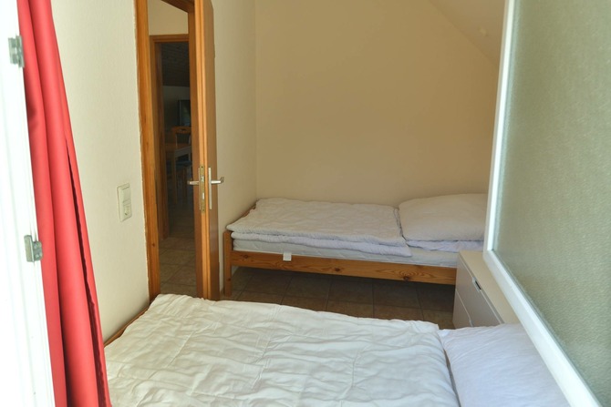 Appartement in Pelzerhaken - Appartement im Ferienpark AM WALDRAND - Schlafzimmer mit zwei Einzelbetten