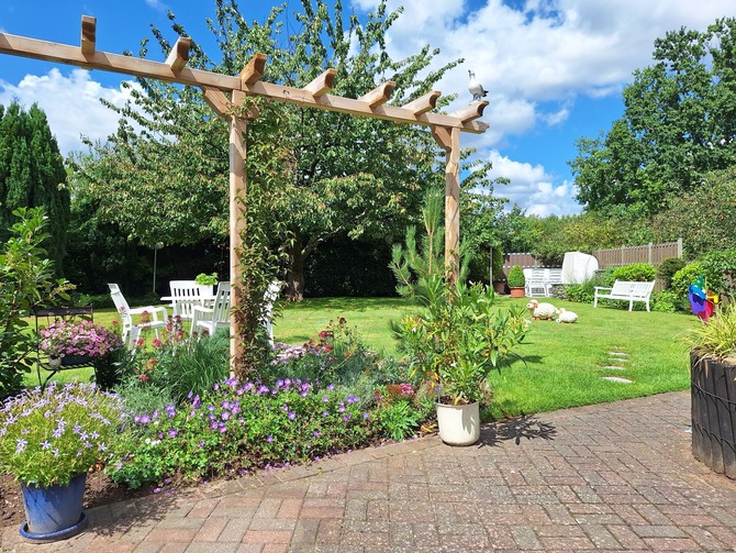 Appartement in Haffkrug - Muschelsucher Backbord - Gästegarten mit Grill