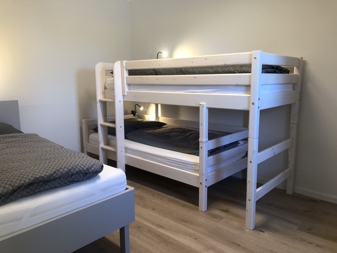 Ferienhaus in Fehmarn OT Gammendorf - Feriendomizil SeeSand 2 - Schlafzimmer mit Etagenbett und Einzelbett