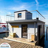 Ferienwohnung in Fehmarn - Hausboot Kaddi`s Sunshine - Huus & Meer - Bild 1